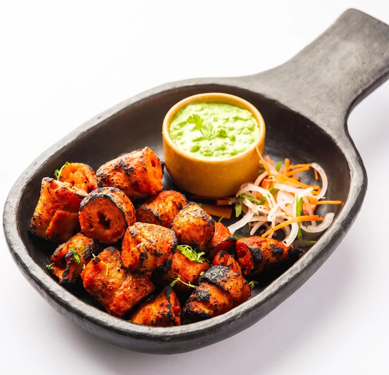 Tandoori chicken tikka served with salad at Desi Swag East Indian Cuisine in St. Vital, Winnipeg
